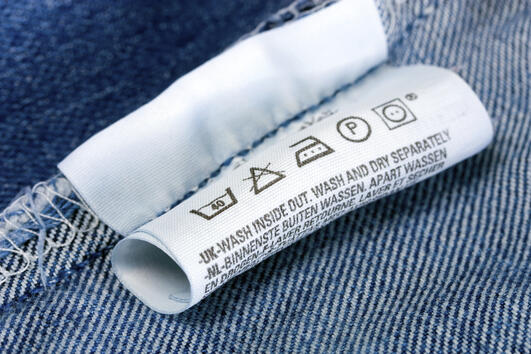 Какво означават знаците върху етикета на дрехите ви?