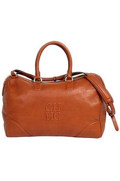 Чантите от Carolina Herrera са по-ярки и "слънчеви" от всякога